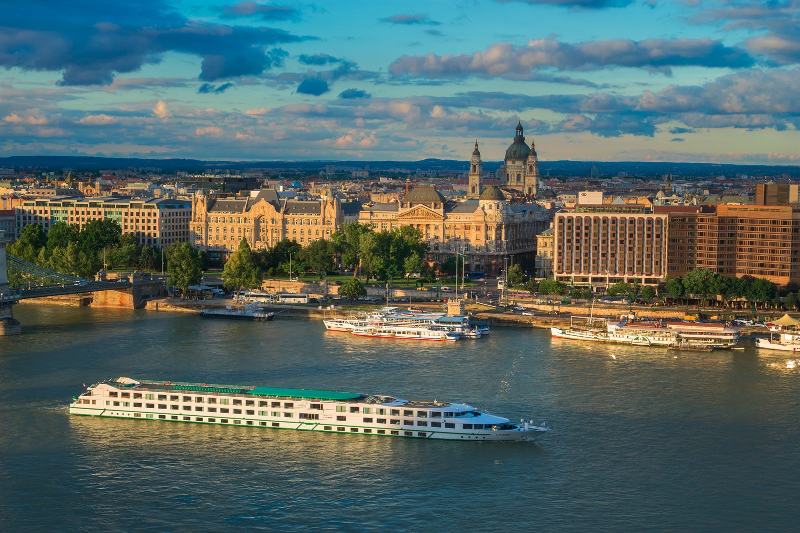River cruise ships on the Danube in Budapest at dusk, the starting point of a Budapest to Black Sea river cruise