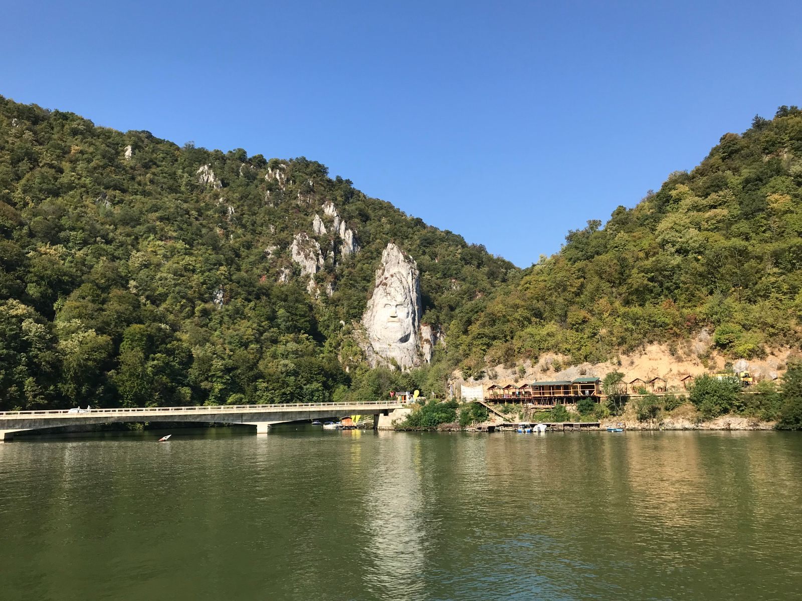 Rock sculpture of Decebalus above the Danube, seen on an Iron Gates river cruise